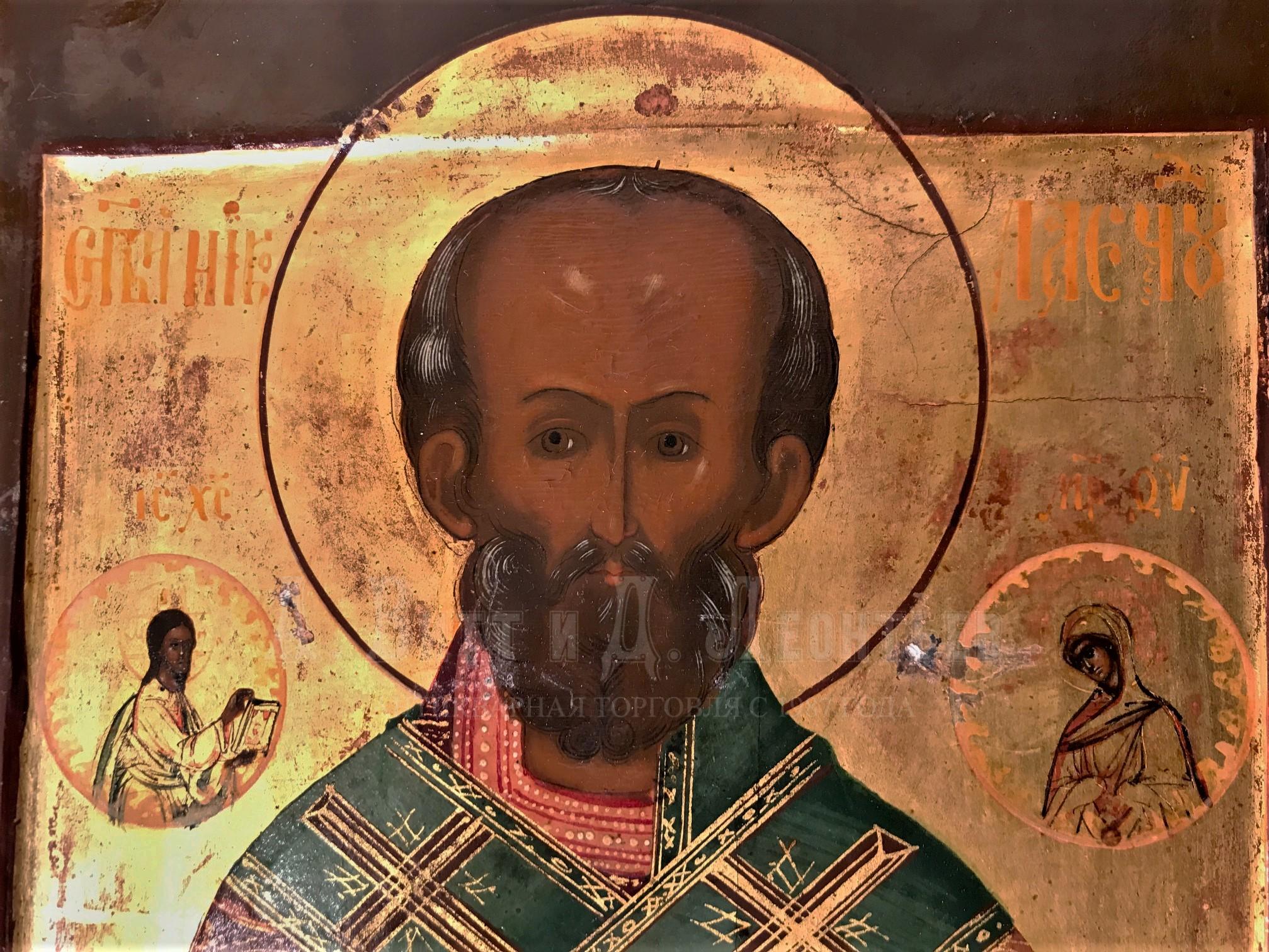 Икона антикварная Святой Николай Чудотворец в серебряном окладе с камнями